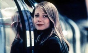 slidingdoors-helen-at-closed-train-doors-300x180